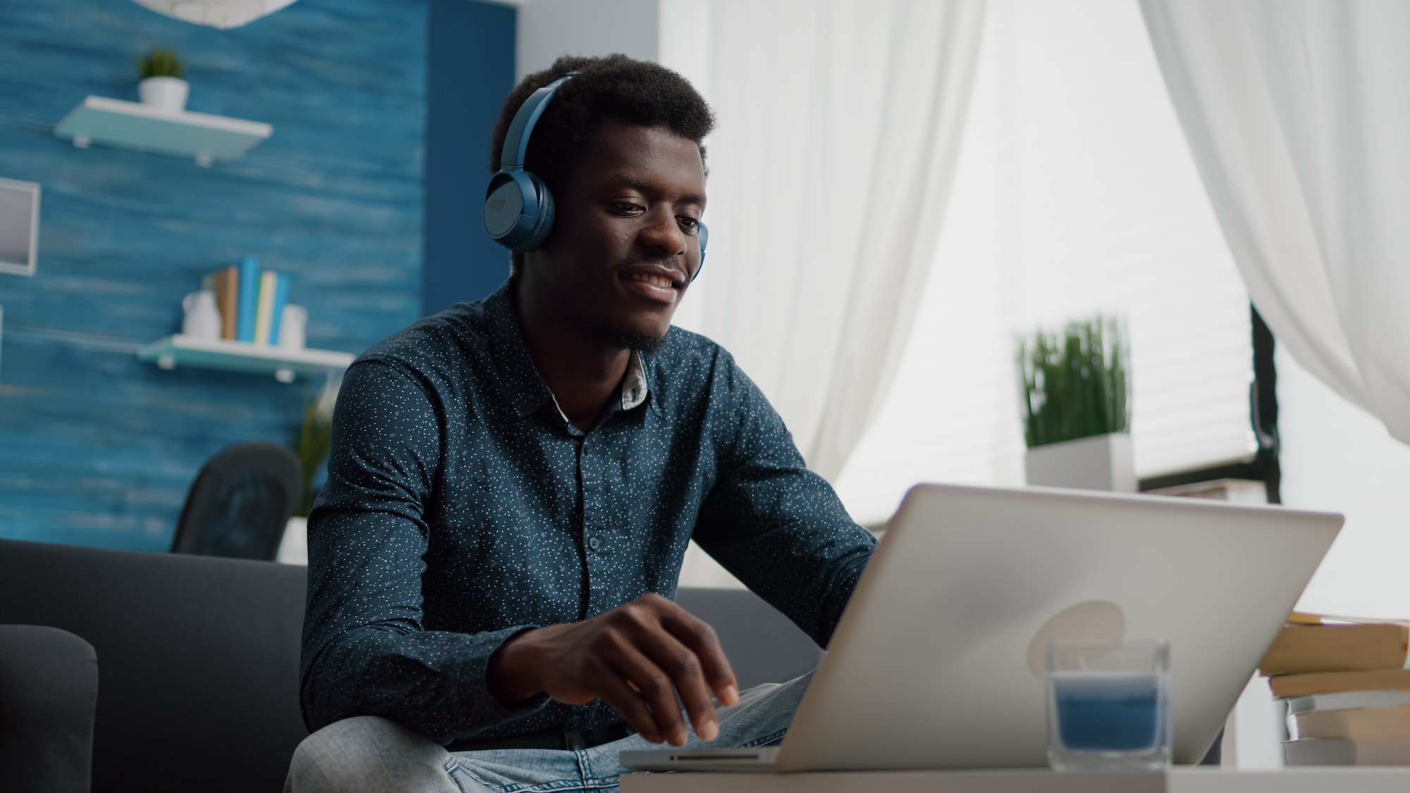 african-american-man-with-headphone-on-watching-movie-on-streaming-services.jpg african-american-man-with-headphone-on-watching-movie-on-streaming-services.jpg