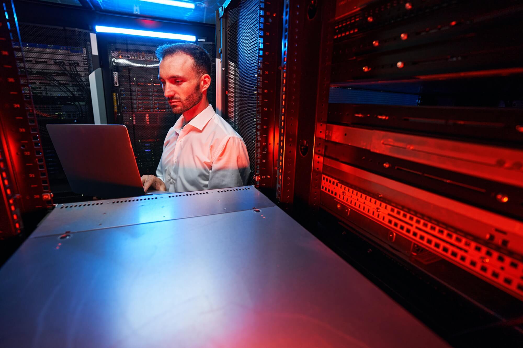 data-center-administrator-inspecting-server-rack-software-1.jpg data-center-administrator-inspecting-server-rack-software-1.jpg