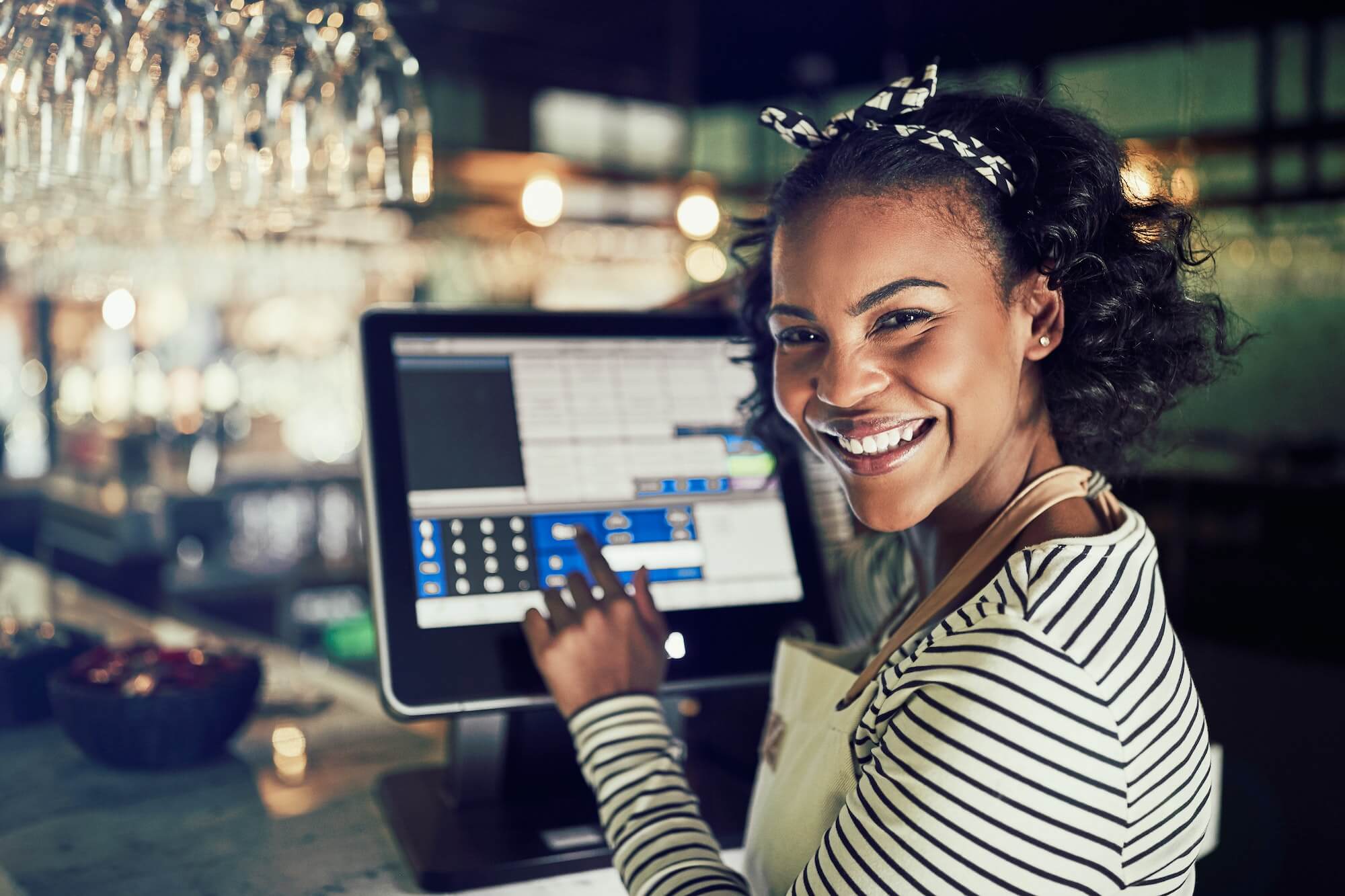 smiling-african-waitress-using-a-restaurant-point-of-sale-terminal-1.jpg smiling-african-waitress-using-a-restaurant-point-of-sale-terminal-1.jpg